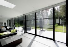 Актуально ли фасадное остекление в частном доме?