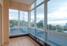 Фасадное остекление балкона: виды и особенности